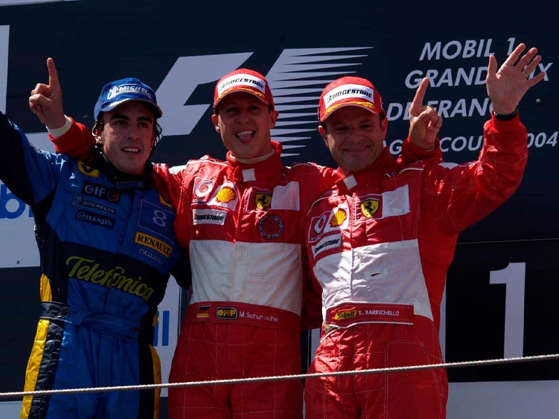 Fernando Alonso on the 2004 French GP podium
